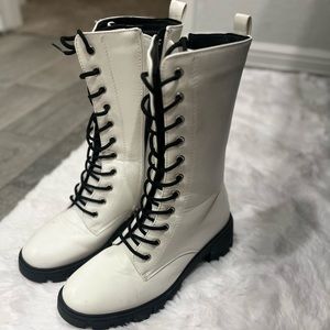 8 white and black boots